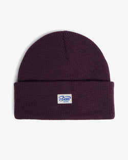 purple deep fit classic skull cap beanie with front branded label in 100% acrylic yarn plain knit